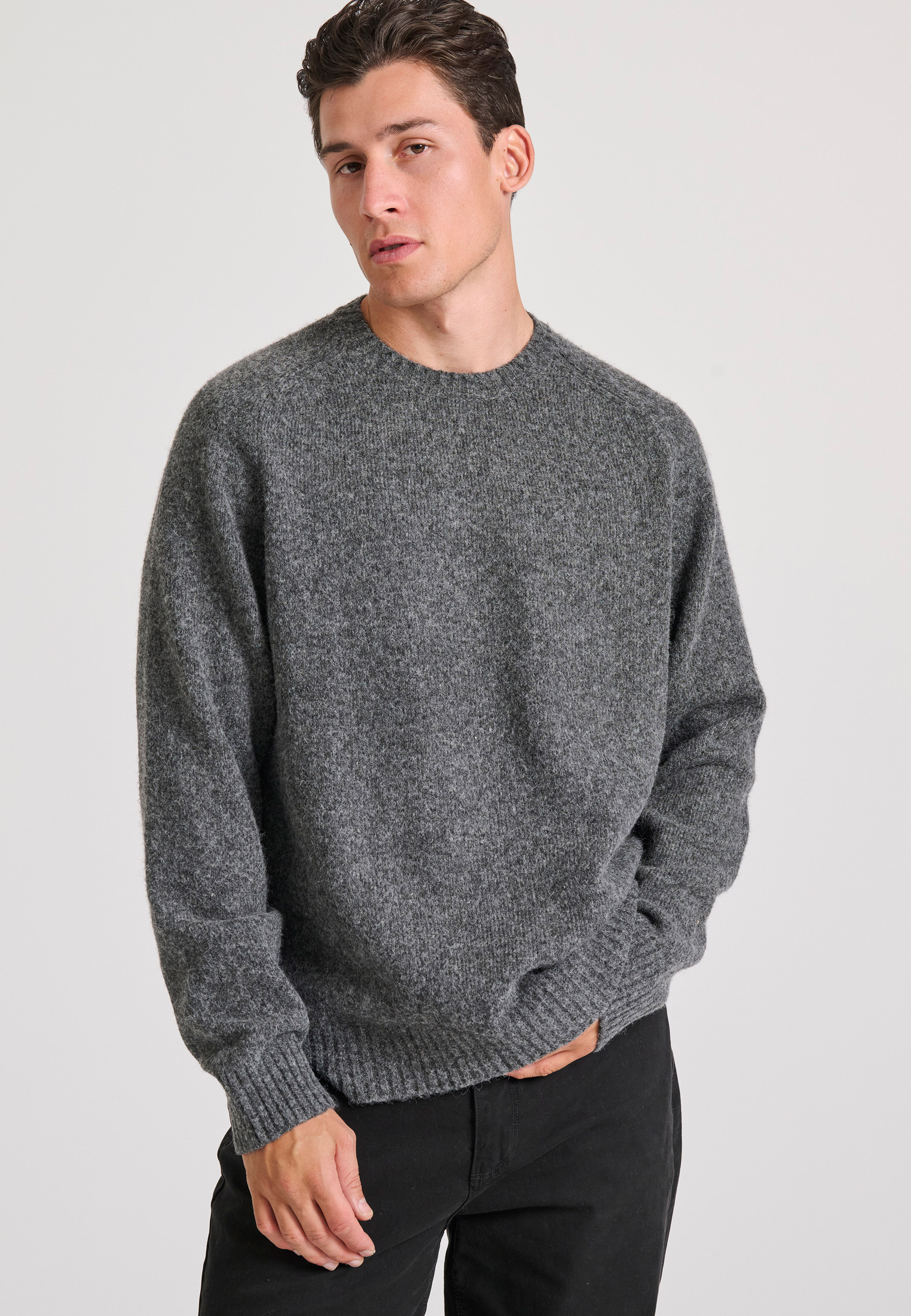 Relaxed fit πλεκτή μπλούζα σε μελανζέ πλέξη