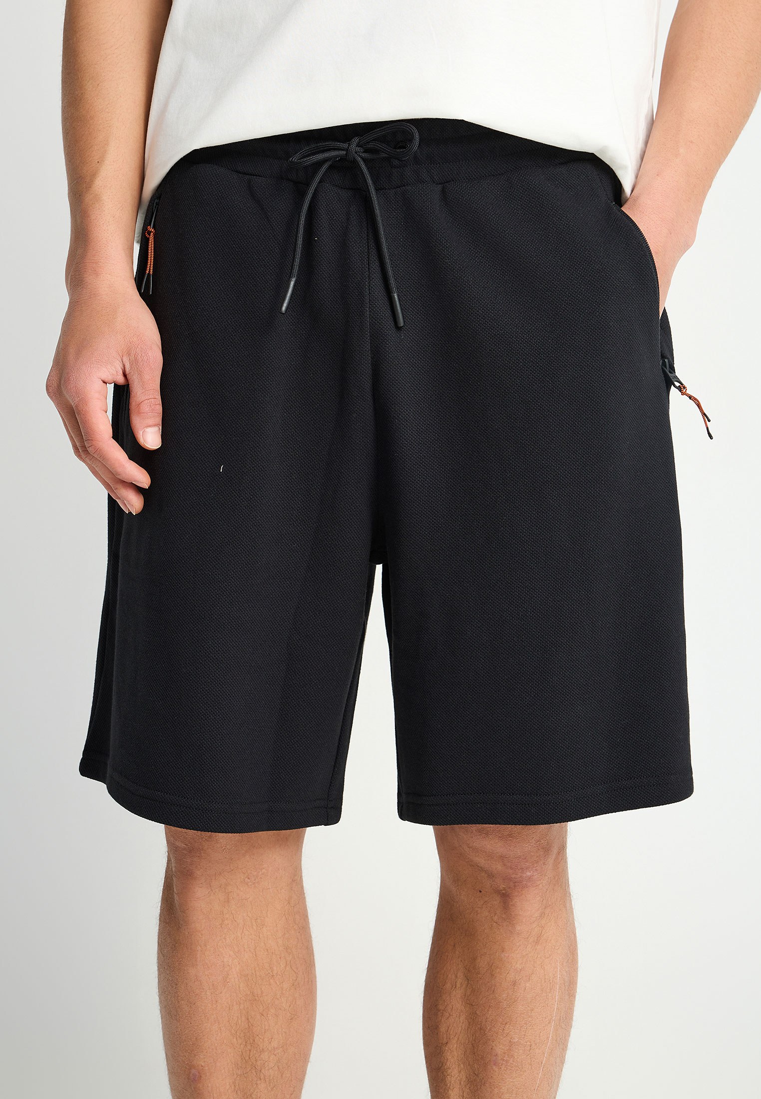 Relaxed fit αθλητική βερμούδα σε πικέ ύφανση